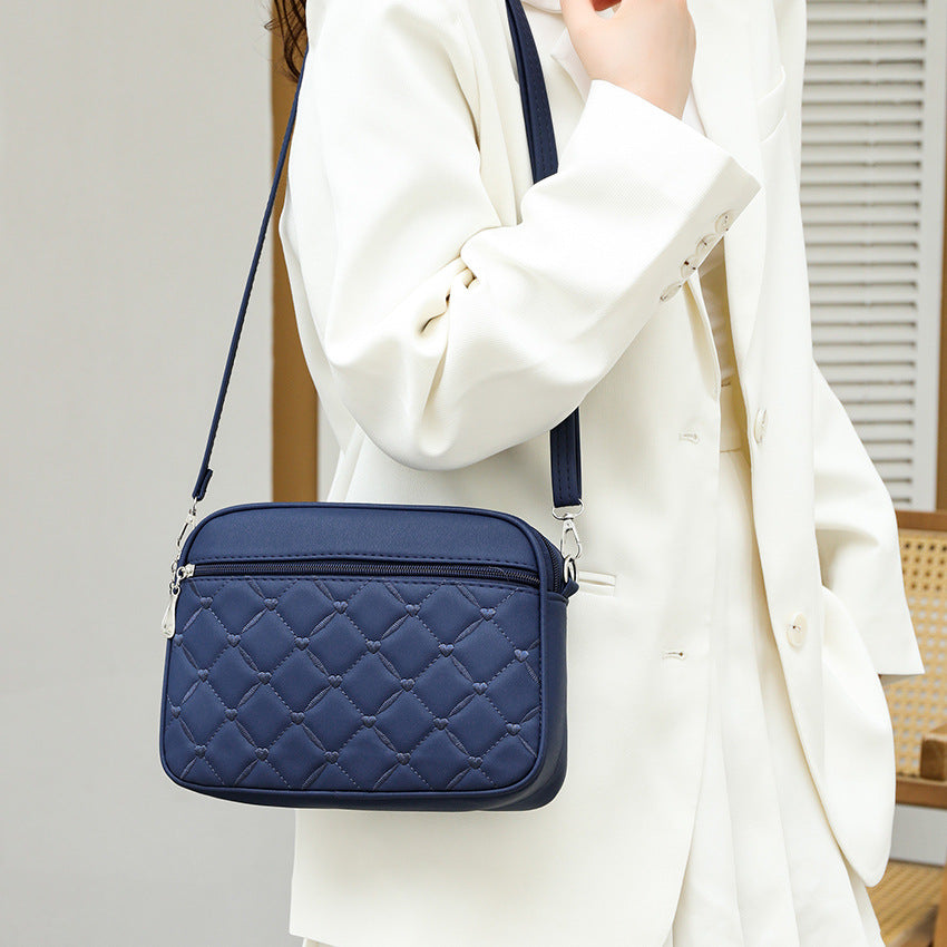 Sana - Multi-Compartment Crossbody Bag